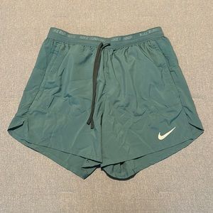 Size small Nike turquoise running shorts